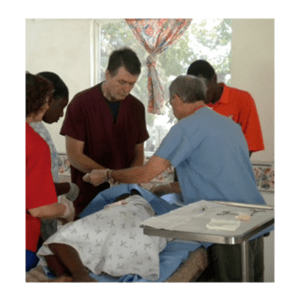 A picture of the doctor treating the young boy