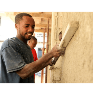 A picture of the man constructing the wall