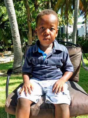 A picture of Ferlens Pierre Charles sitting on the chair