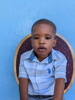 A picture of Theodore Jefferson sitting on the chair
